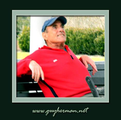 Guy Herman seated outdoors